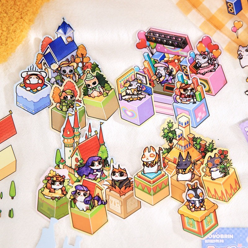 StationeryHaul 3D scene sticker pack with cute cat characters in various settings like castles, stages, and pyramids. PVC material.