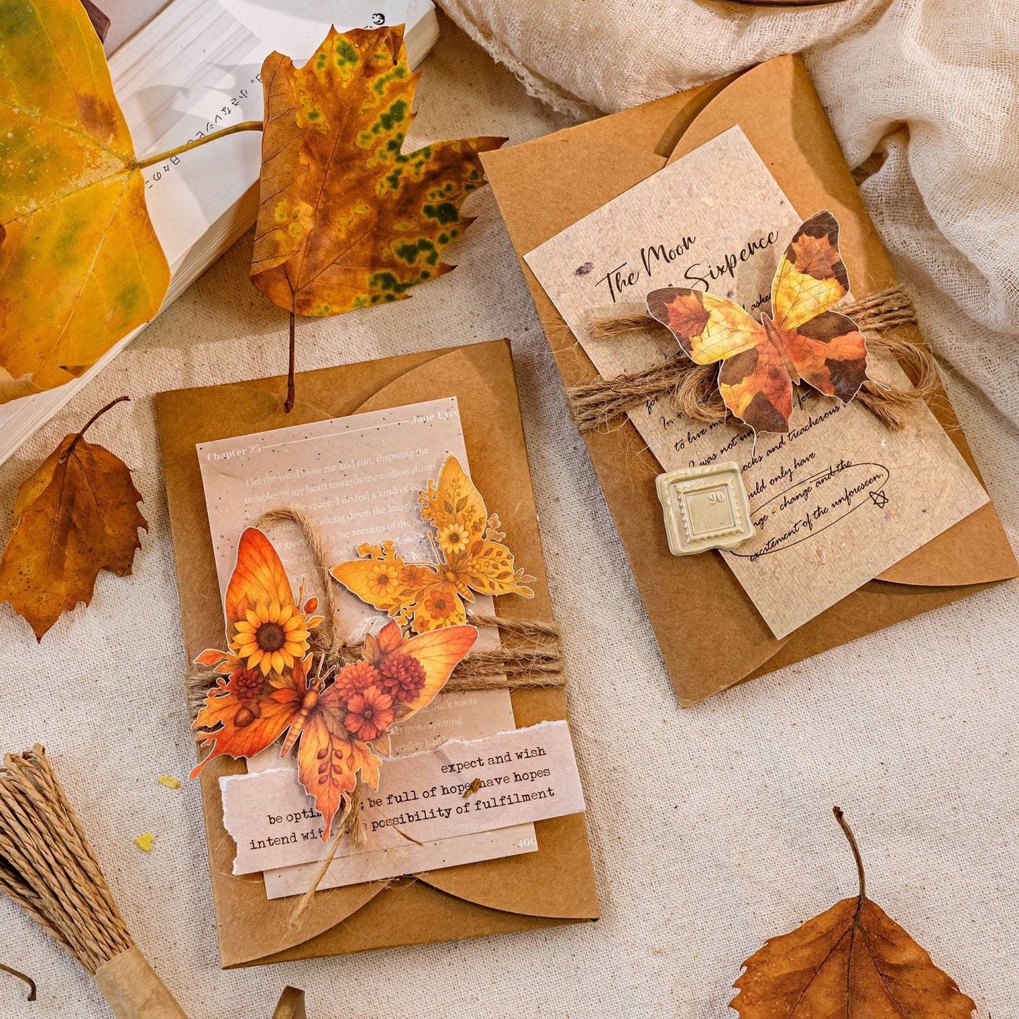 StationeryHaul Autumn Forest Fairy and Woodland Creature sticker collection on kraft envelopes with twine and dried leaves.