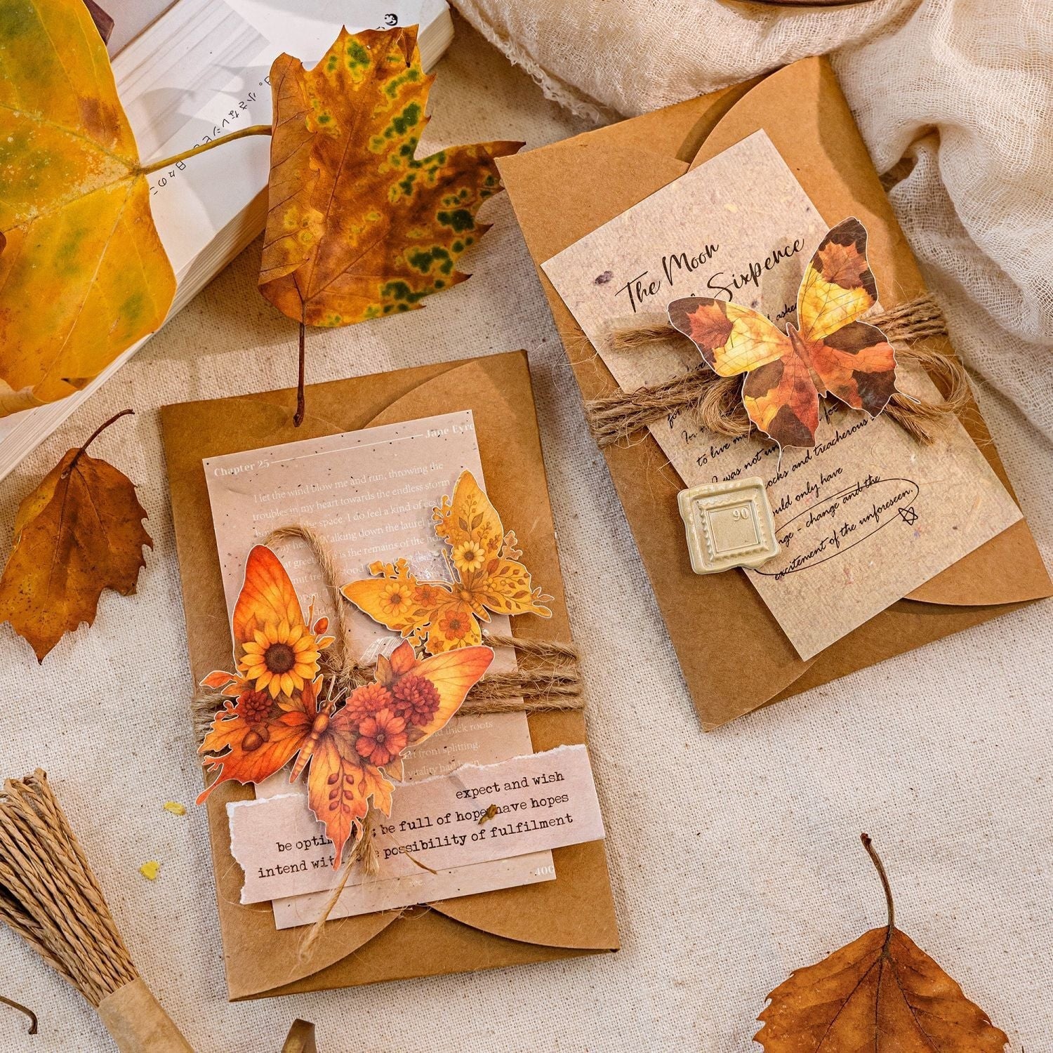 StationeryHaul Autumn Forest Fairy and Woodland Creature sticker collection on kraft envelopes with twine and dried leaves.