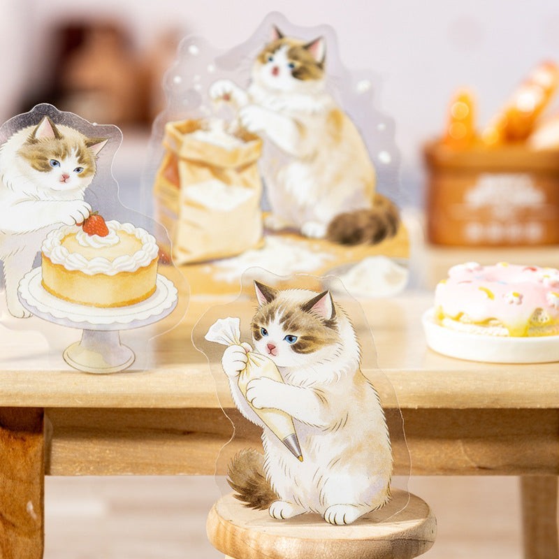 StationeryHaul transparent cat stickers: one decorating a cake, one baking, one with a piping bag.