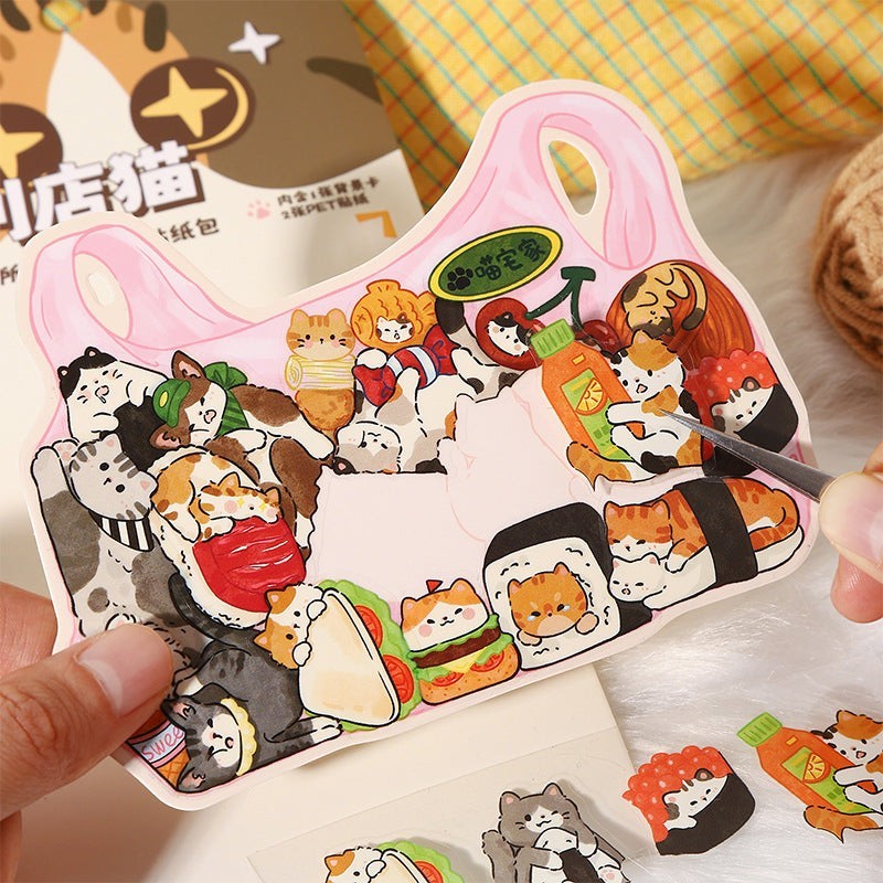 StationeryHaul cute cat stickers featuring cats dressed as sushi, burgers, and in various playful poses. Waterproof PET material.