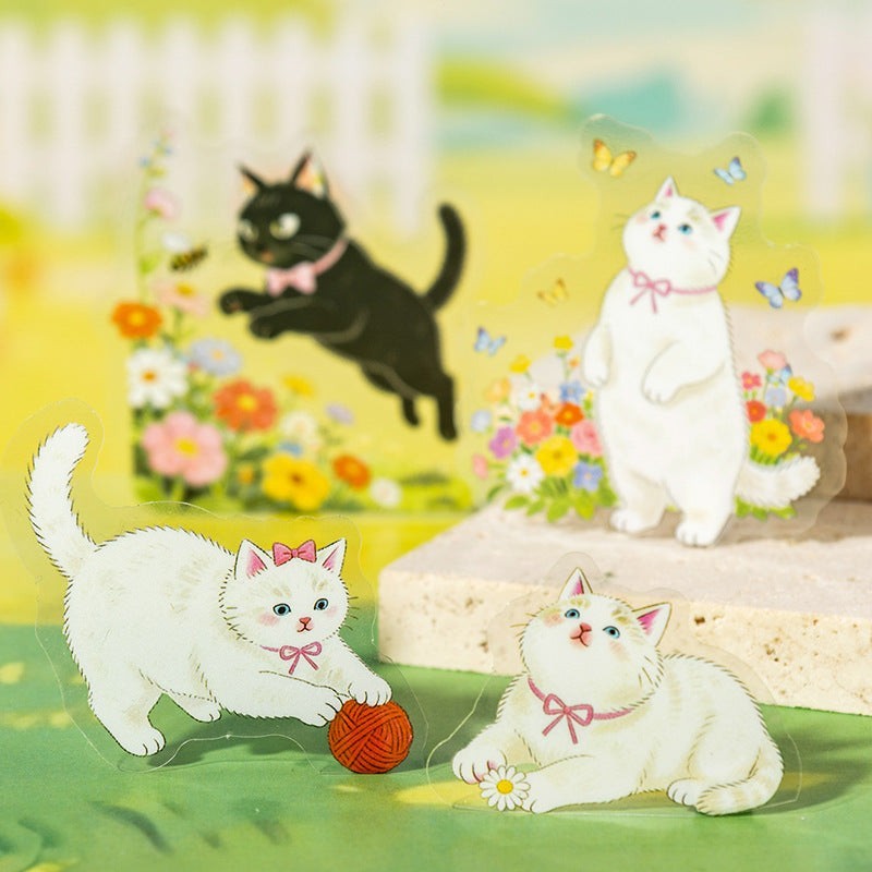 StationeryHaul transparent cat stickers: black cat leaping, white cats playing with yarn and flower.