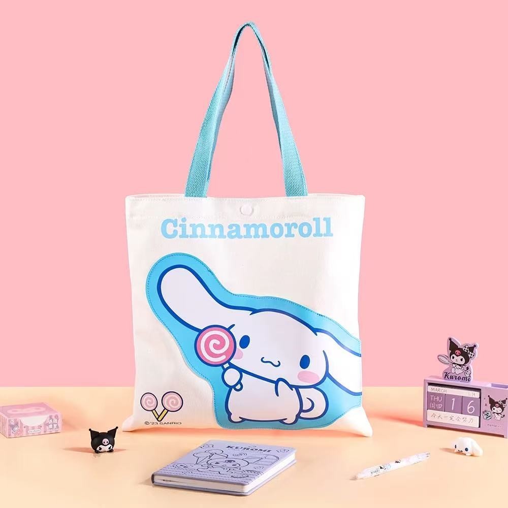 StationeryHaul white canvas tote bag with Cinnamoroll character and blue handles, large capacity for students.