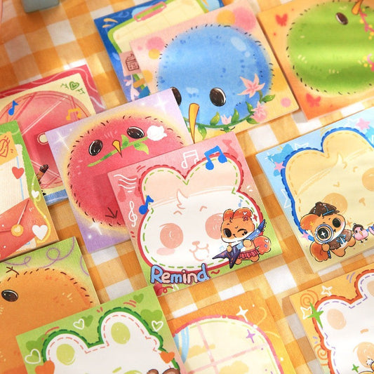 StationeryHaul cute animal sticky notes featuring birds, bunnies, and bears with musical notes and flowers.