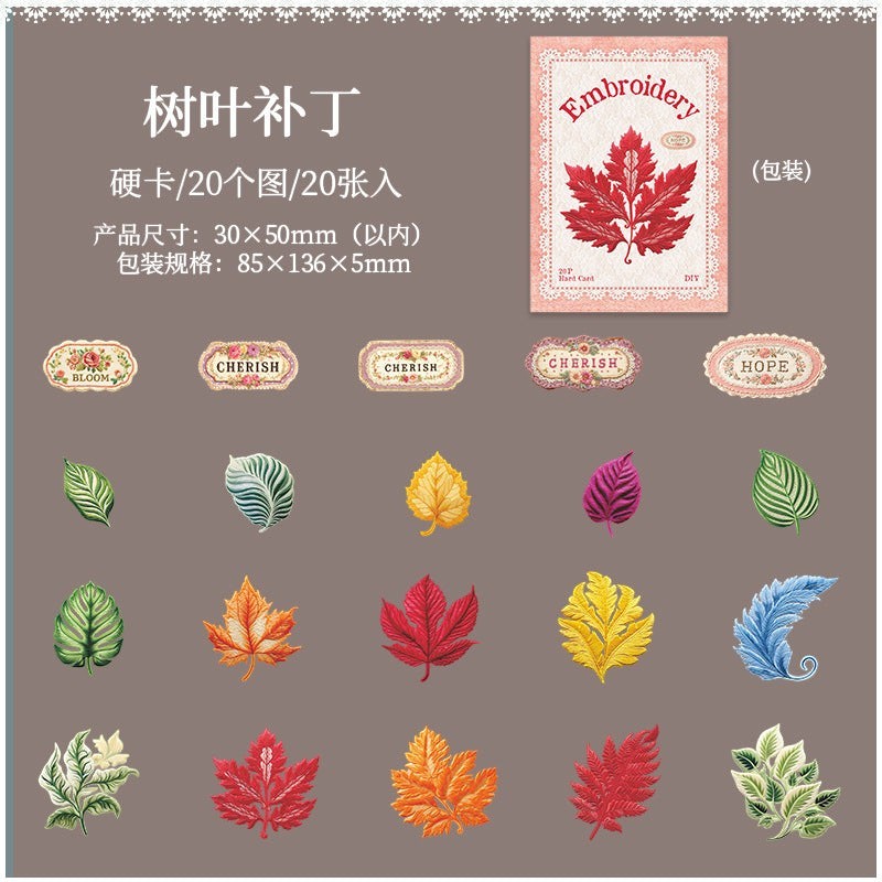 StationeryHaul nature-inspired decorative stickers featuring embroidered leaves in red, orange, yellow, purple, blue, and green, plus floral labels.