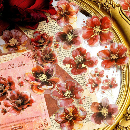 StationeryHaul floral PET stickers with gold foil accents, featuring deep red and brown watercolor flower designs.
