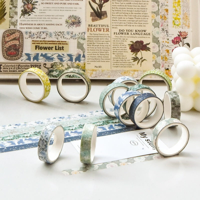 StationeryHaul floral washi tape set featuring 5 rolls of decorative paper tape with vintage botanical patterns.