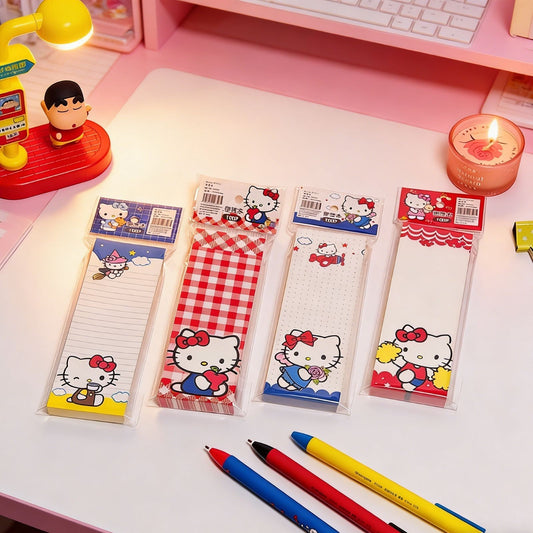 StationeryHaul Hello Kitty long memo notebooks with colorful character patterns on a desk with pens