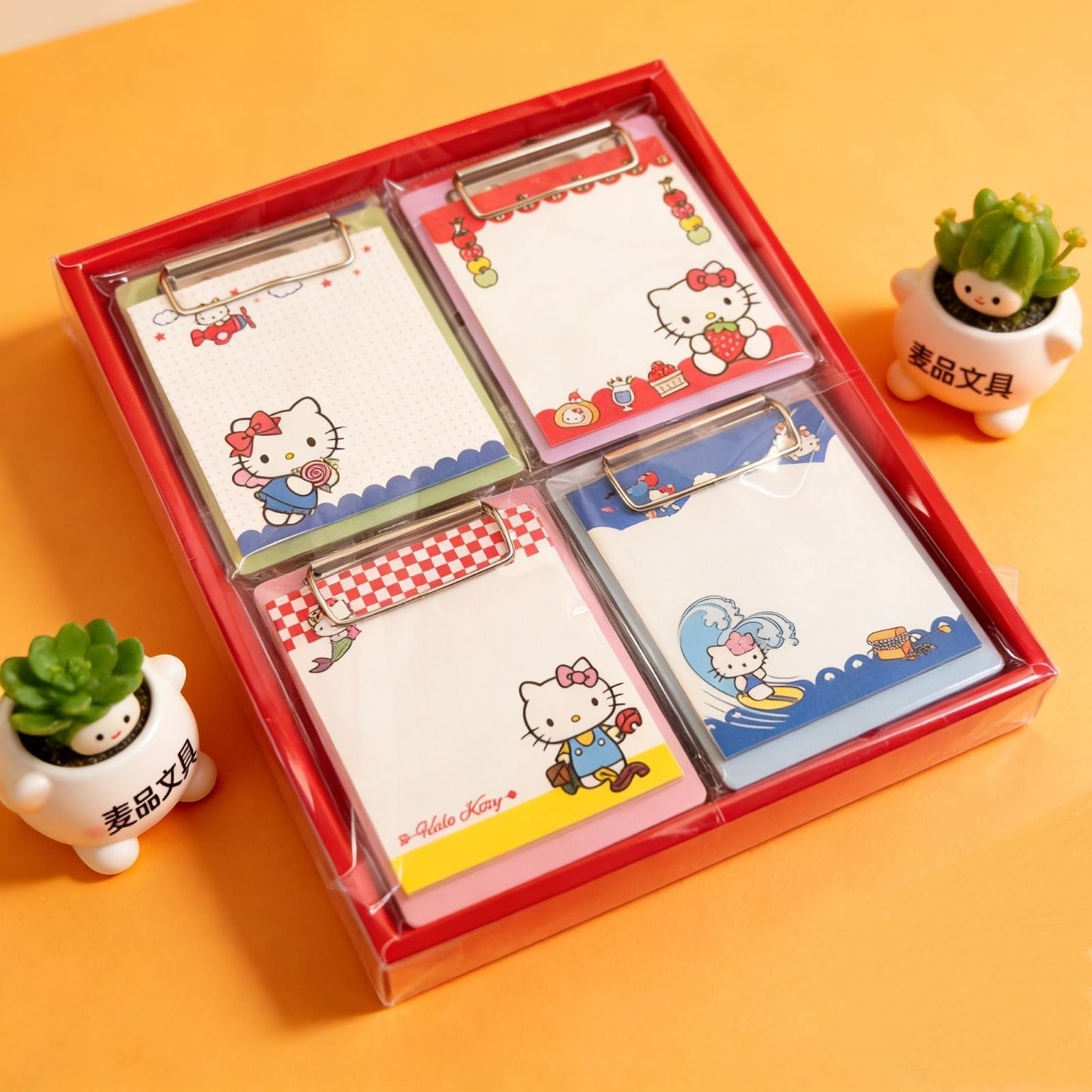 StationeryHaul Hello Kitty memo pad set with four colorful clipboards and cute character designs for students.