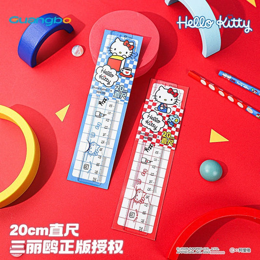 StationeryHaul 20cm Hello Kitty transparent plastic rulers in blue and red designs on a vibrant desk background
