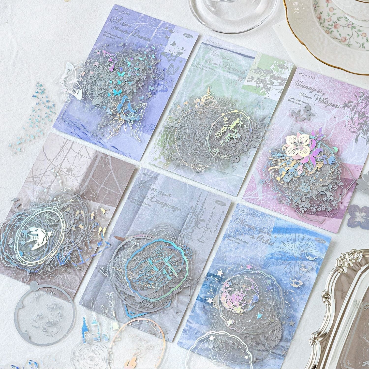 StationeryHaul iridescent butterfly and floral decorative sticker set with transparent material and shimmering finish.