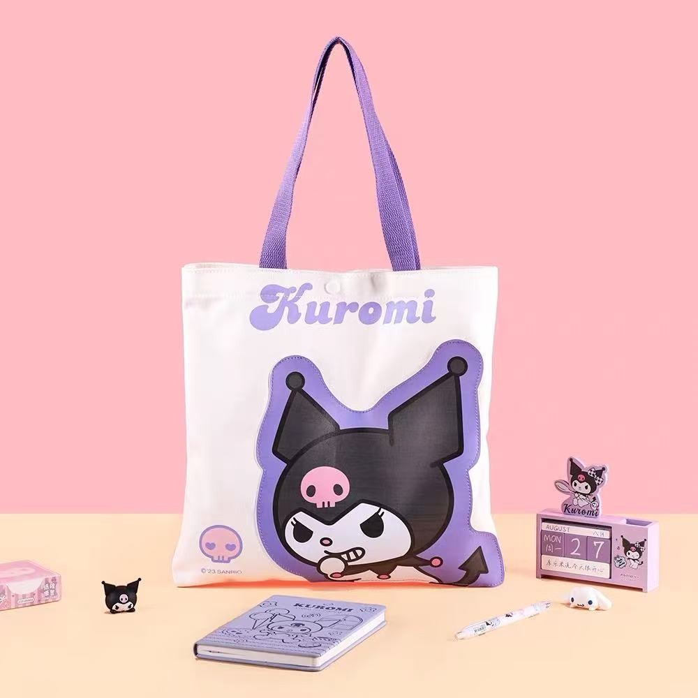 StationeryHaul white canvas tote bag with large Kuromi character graphic and purple handles. Perfect for students.