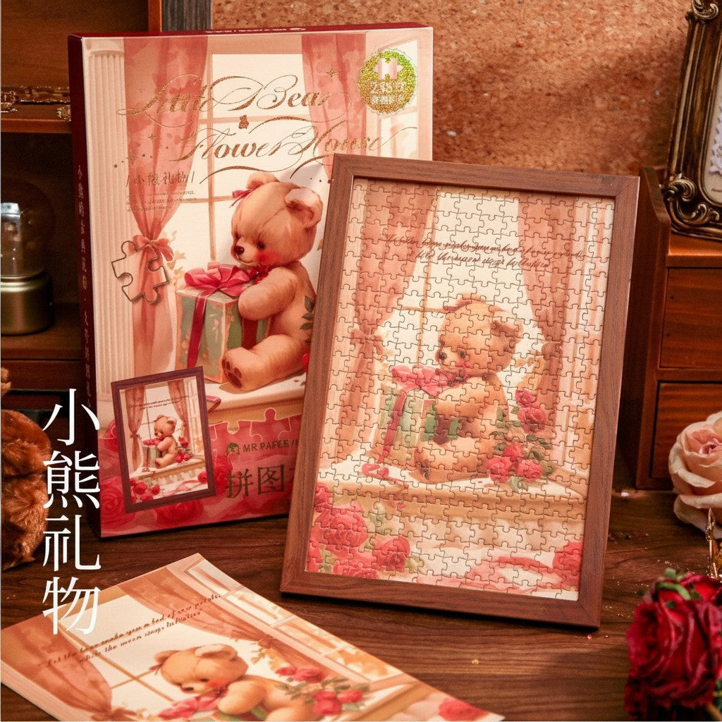 StationeryHaul Little Bear Flower House 288-piece puzzle set featuring a teddy bear with roses and gift, framed and on display.