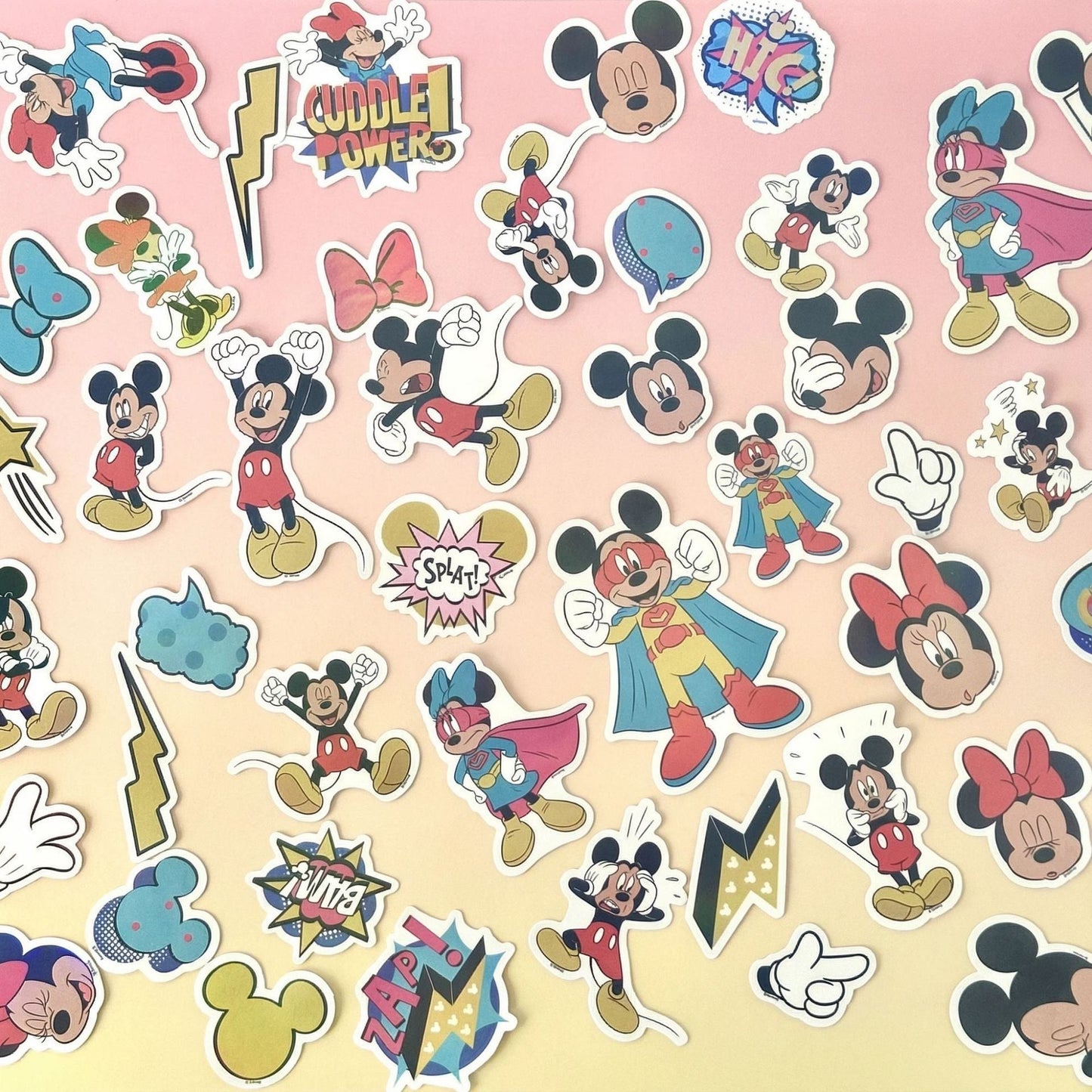 StationeryHaul Mickey Mouse and Friends sticker pack featuring characters in superhero costumes and classic poses. Includes Minnie Mouse, Pluto, and Goofy. Waterproof vinyl.