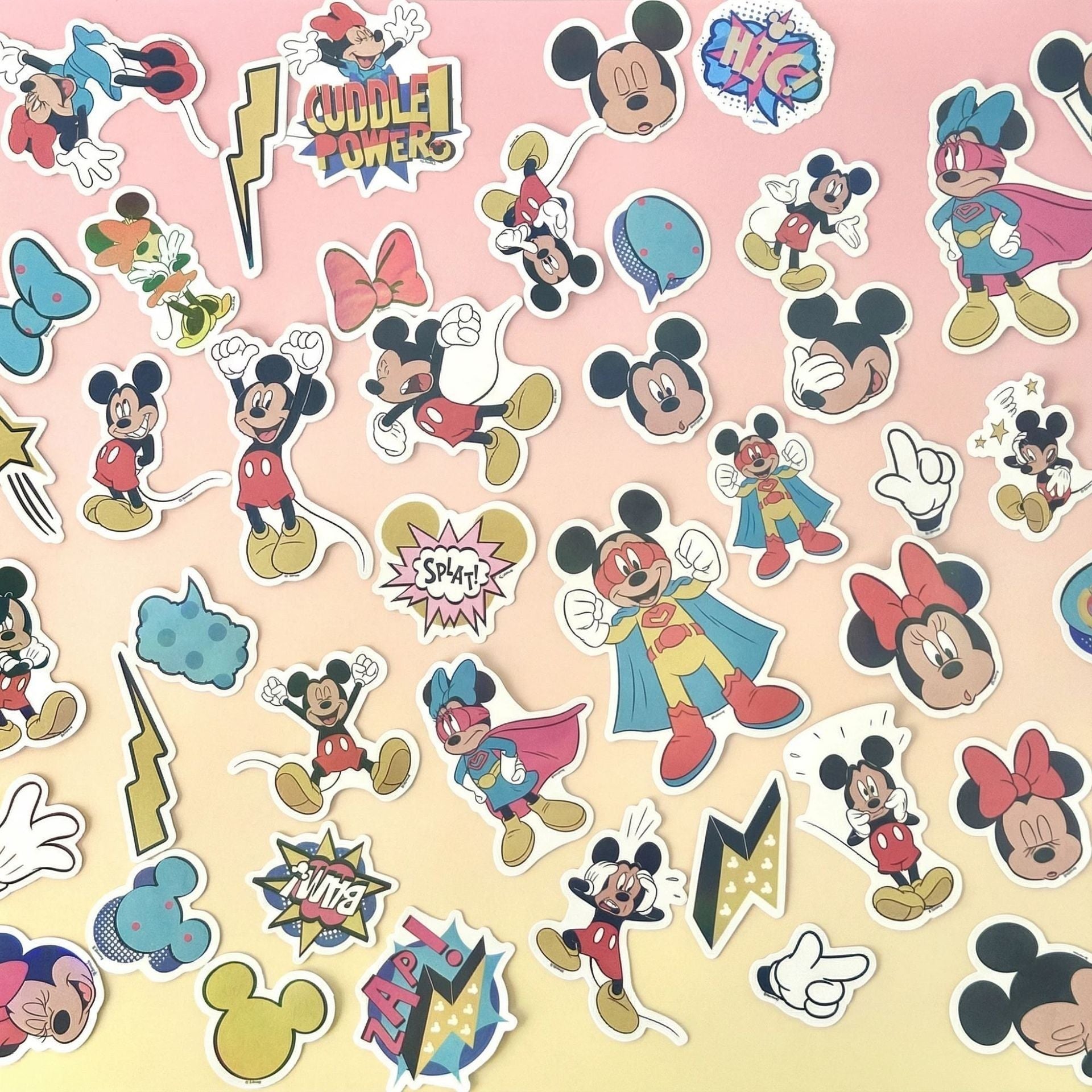 StationeryHaul Mickey Mouse and Friends sticker pack featuring characters in superhero costumes and classic poses. Includes Minnie Mouse, Pluto, and Goofy. Waterproof vinyl.