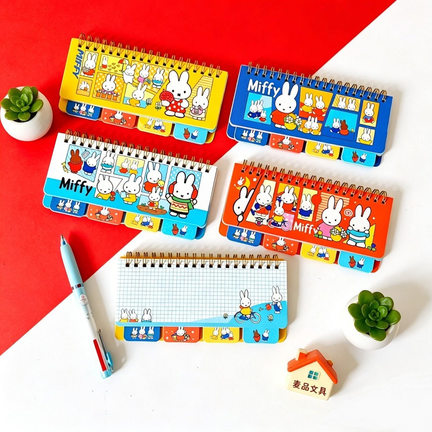 StationeryHaul Miffy rabbit coil notebooks with colorful character covers, grid paper, and index tabs on a desk.