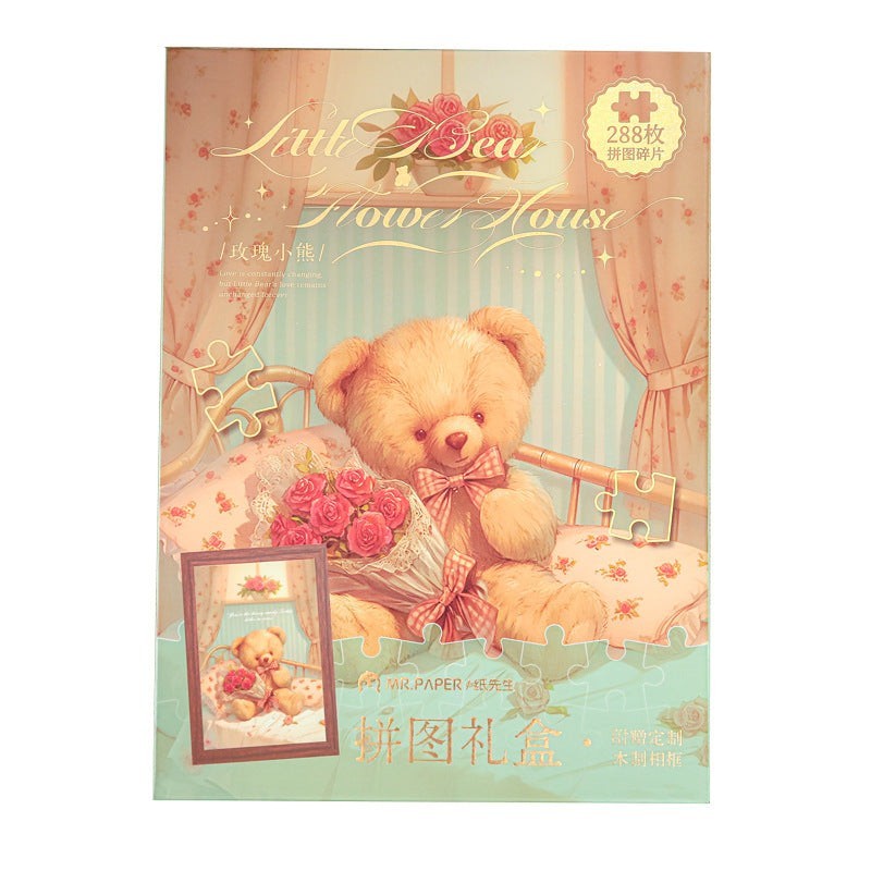 StationeryHaul Mr. Paper puzzle gift box featuring a teddy bear in a floral bed, holding roses. 288 pieces.