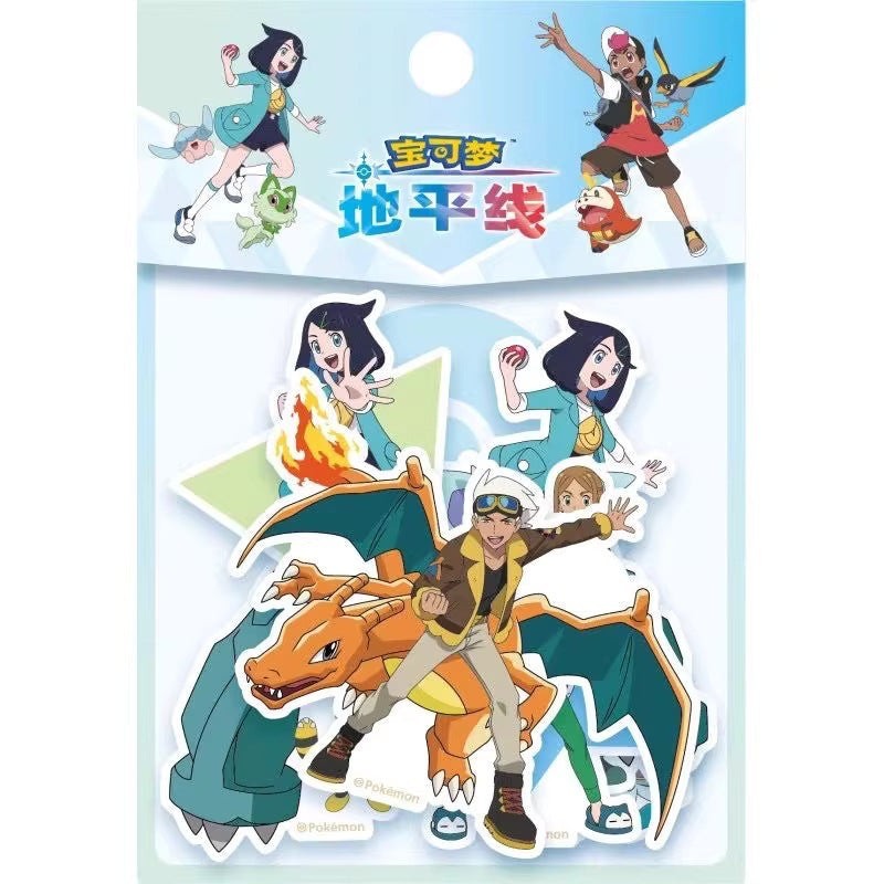 StationeryHaul Pokemon sticker pack featuring Charizard, trainers, and starter Pokemon like Sprigatito, Fuecoco, and Quaxly.
