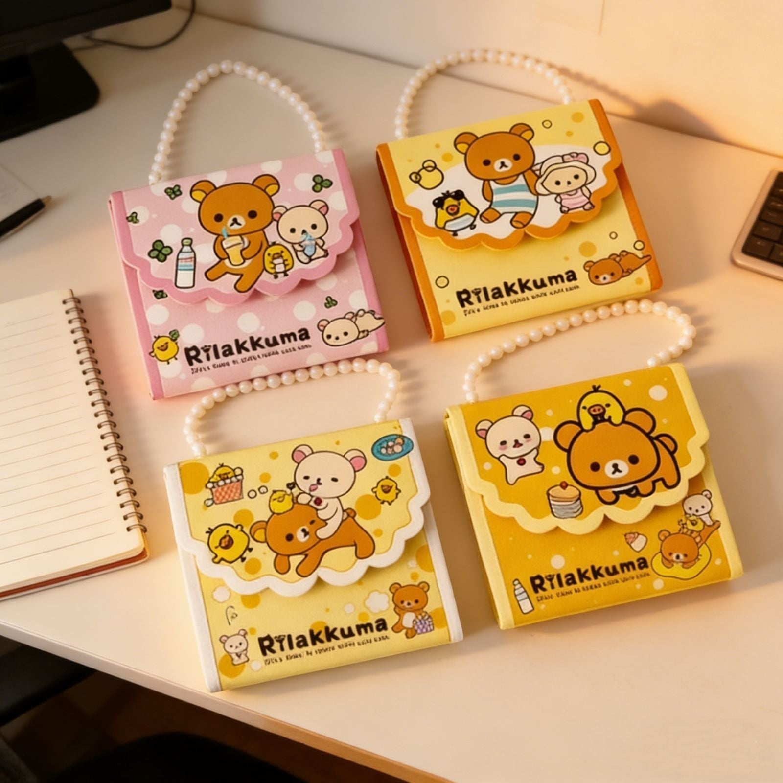 StationeryHaul Rilakkuma pearl chain tote bag style folding notebooks in yellow and pink with cute character designs