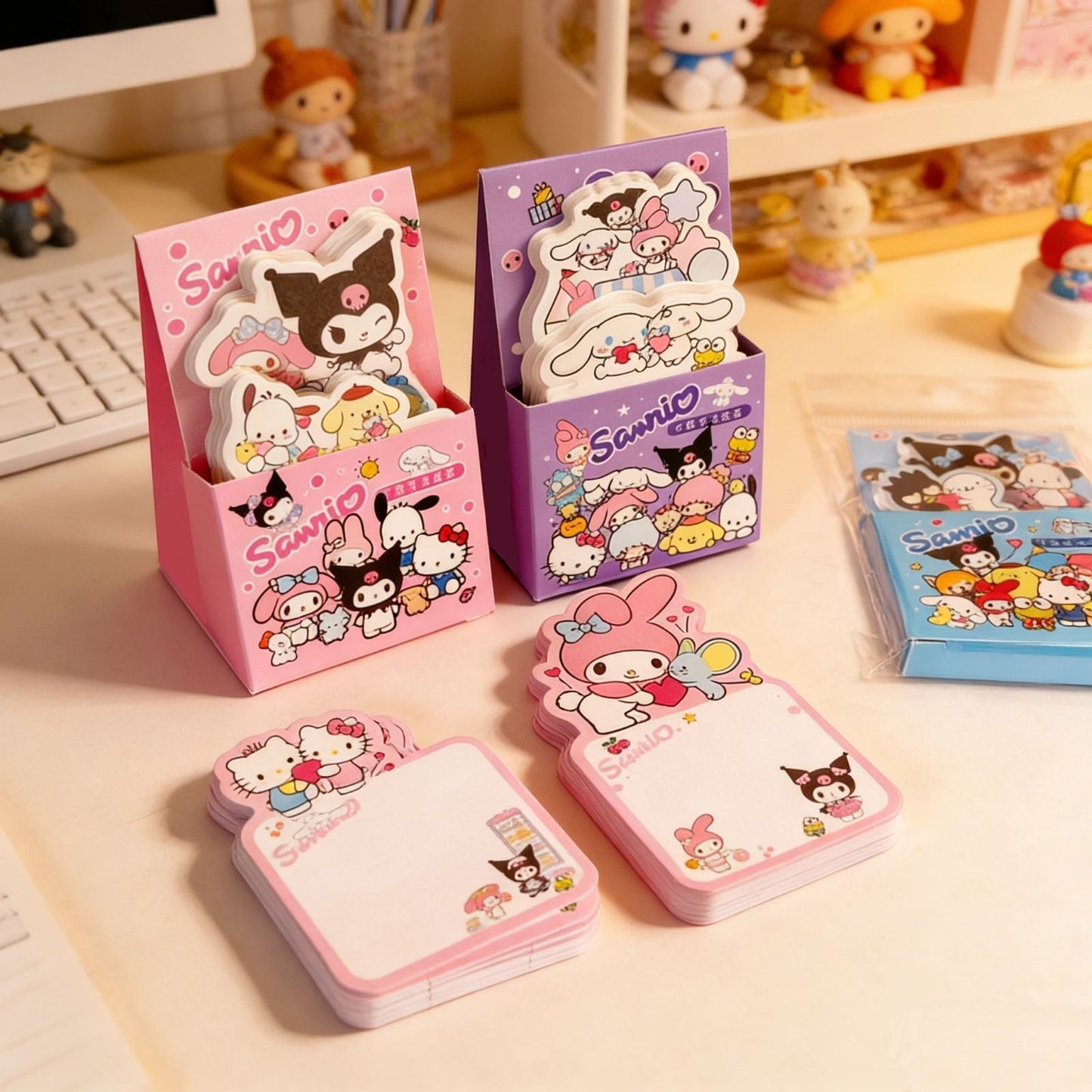 StationeryHaul Sanrio Hello Kitty character pocket note paper books in pink and purple desk organizers