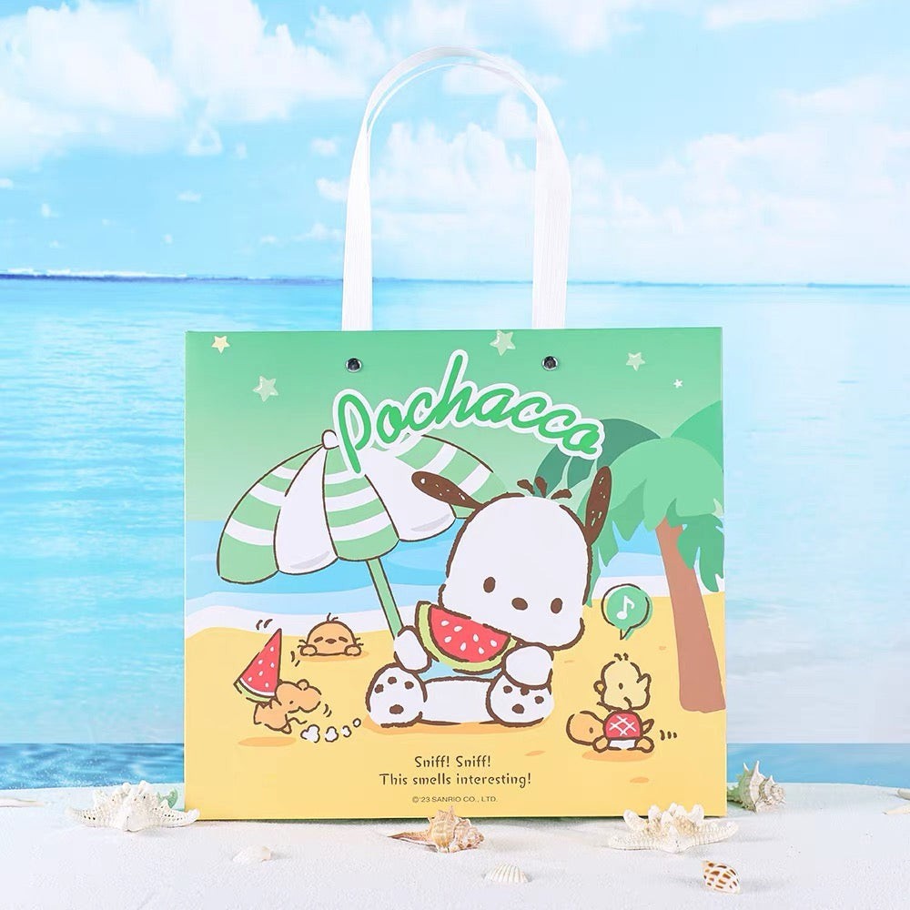 StationeryHaul Sanrio Pochacco gift bag with beach scene, featuring Pochacco eating watermelon under an umbrella.