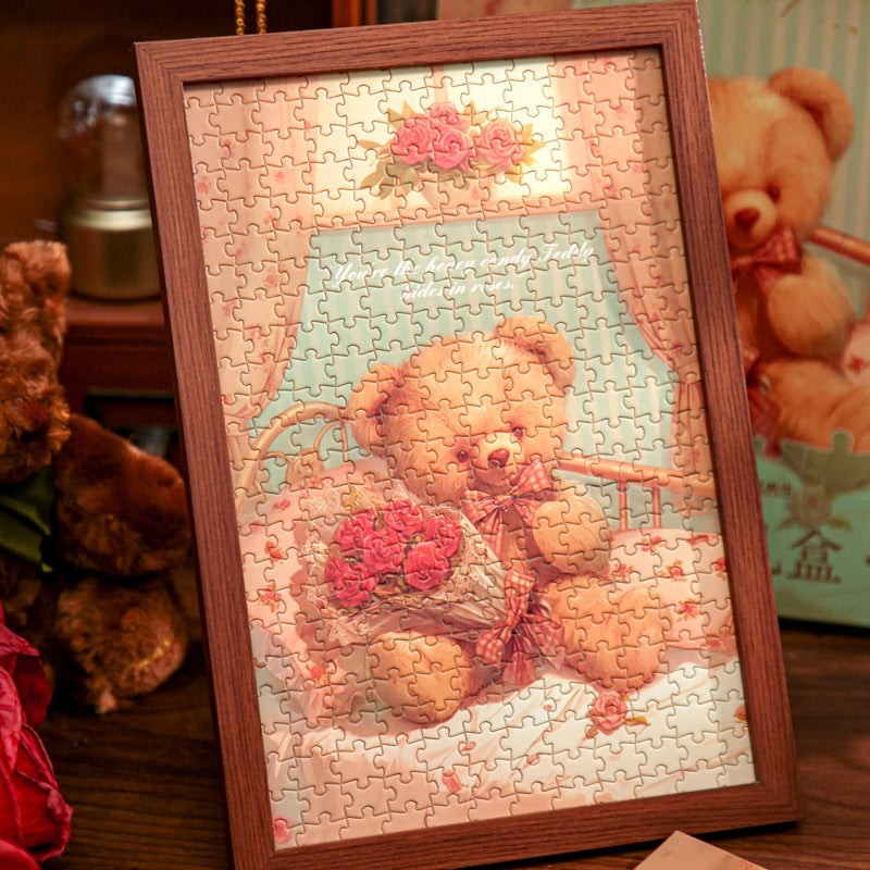StationeryHaul framed puzzle featuring a teddy bear holding a bouquet of roses, with a floral background and text.