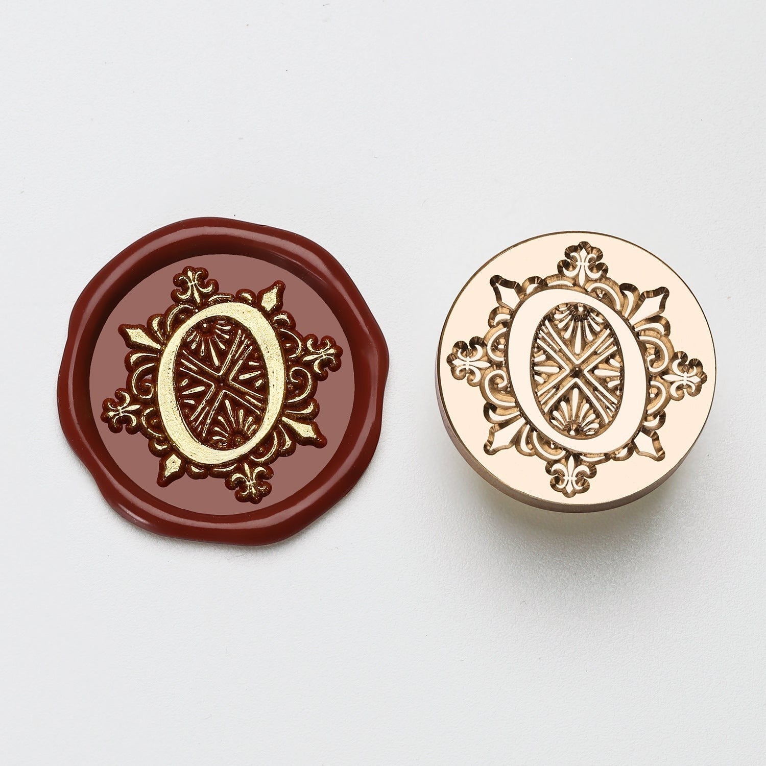 StationeryHaul elegant letter O wax seal stamp with ornate details on burgundy wax and brass stamp.