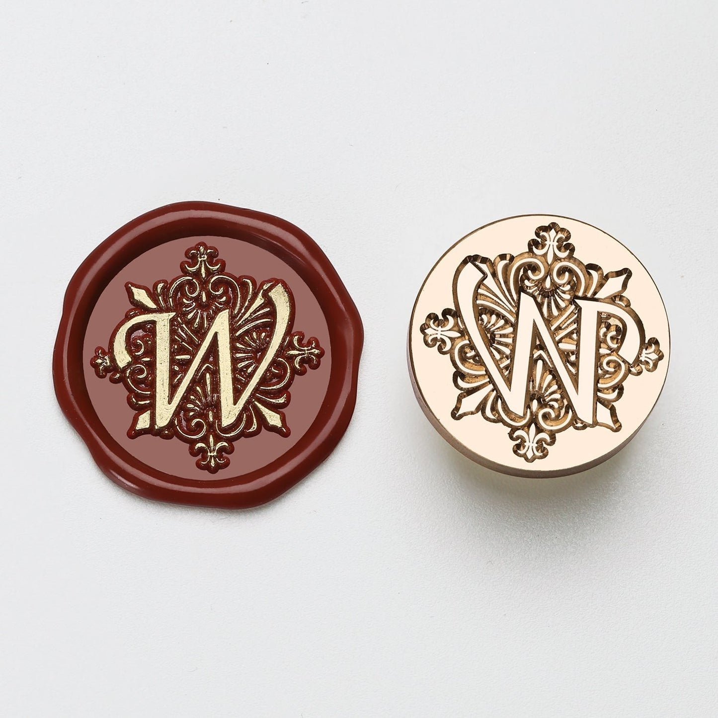 StationeryHaul elegant brass wax seal stamp with letter W design, shown with a burgundy wax impression.