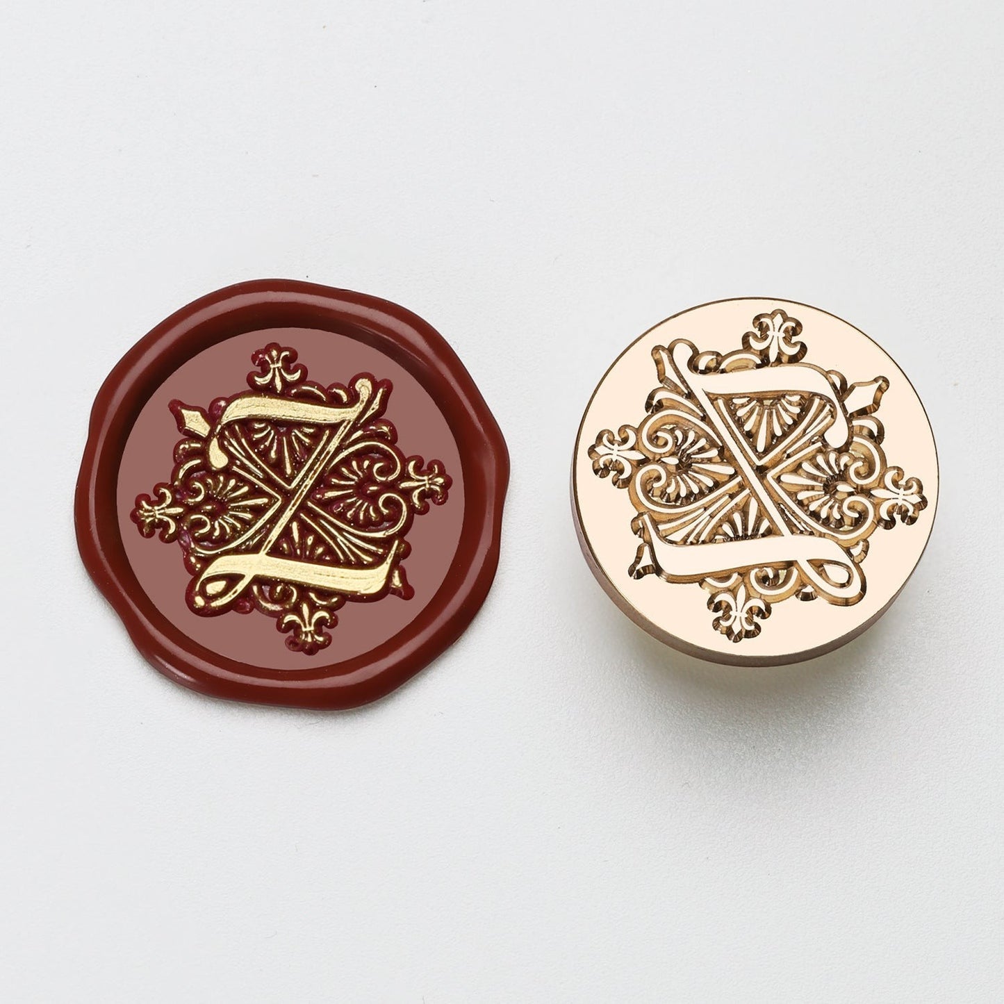 StationeryHaul elegant letter Z wax seal stamp with gold detailing on burgundy wax and brass stamp.